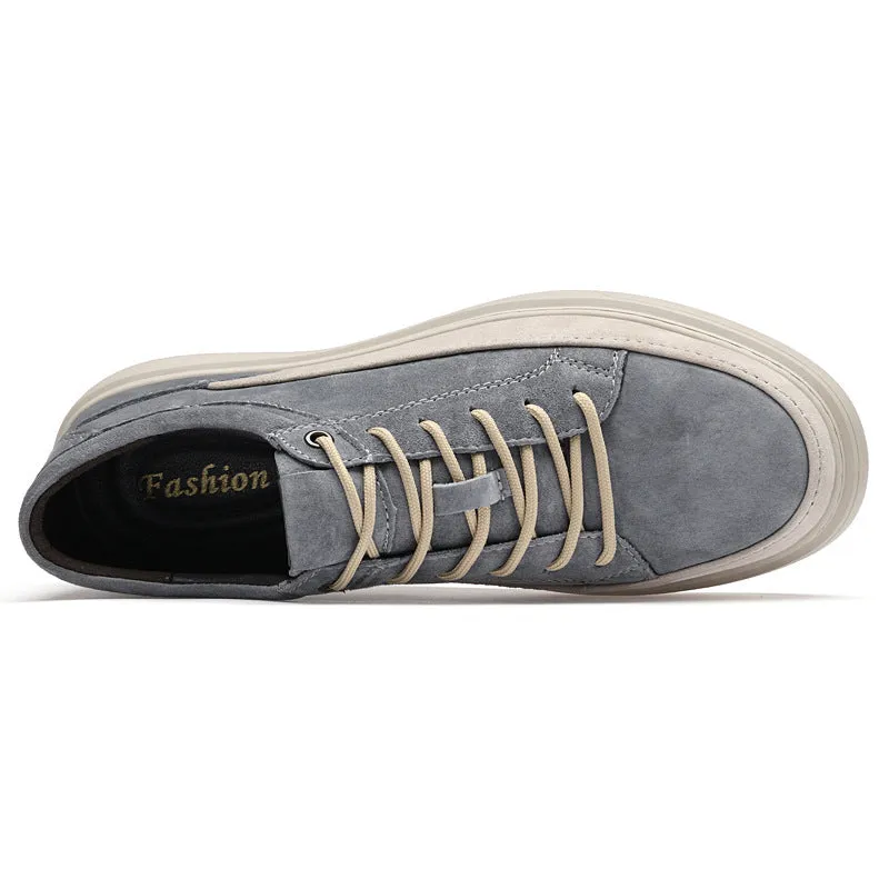 Men's grey pigskin leather casual skate shoes with round toe and flat rubber sole on a light background.