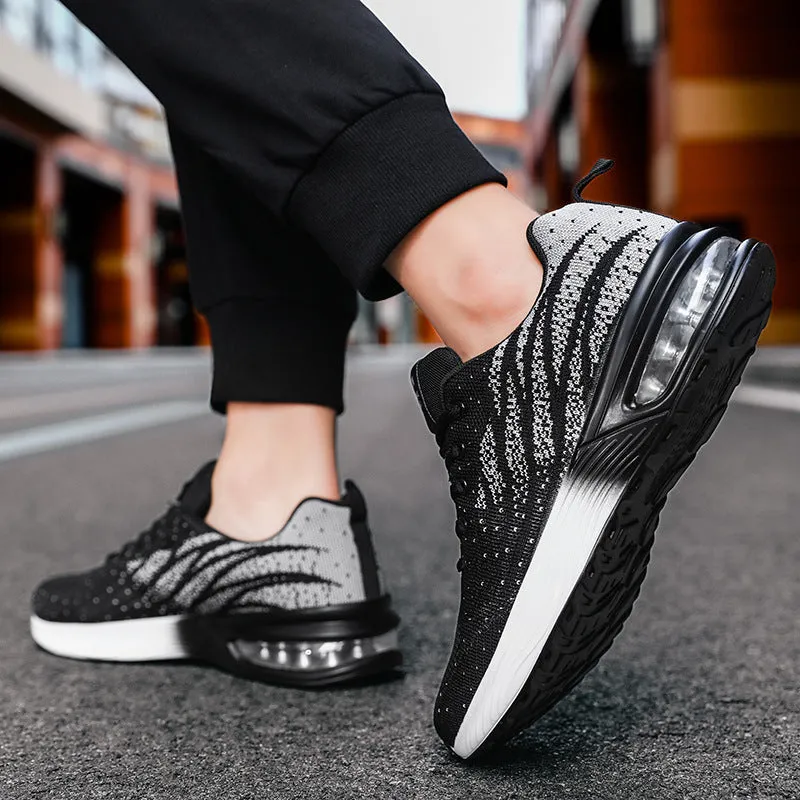 Men's air cushion casual running shoes in black and red with flyknit upper and wedge heel on white background