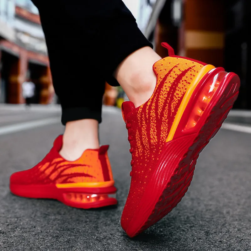 Men's air cushion casual running shoes in black and red with flyknit upper and wedge heel on white background