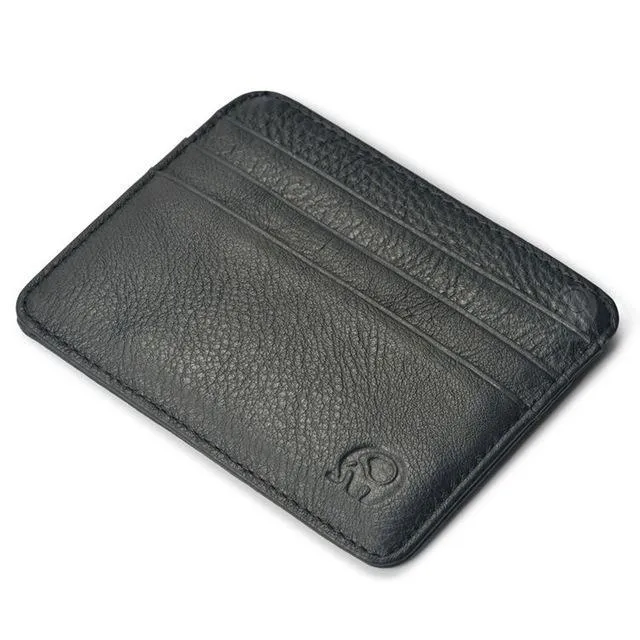 Genuine leather magic wallet in brown, open to show 27 card slots, money clip, and ID window