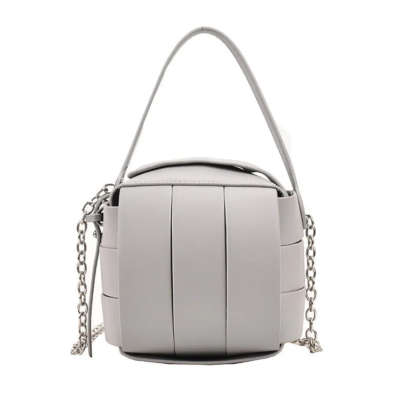 Women's PU leather vintage spliced crossbody handbag in black with magnetic buckle closure, 14cm size