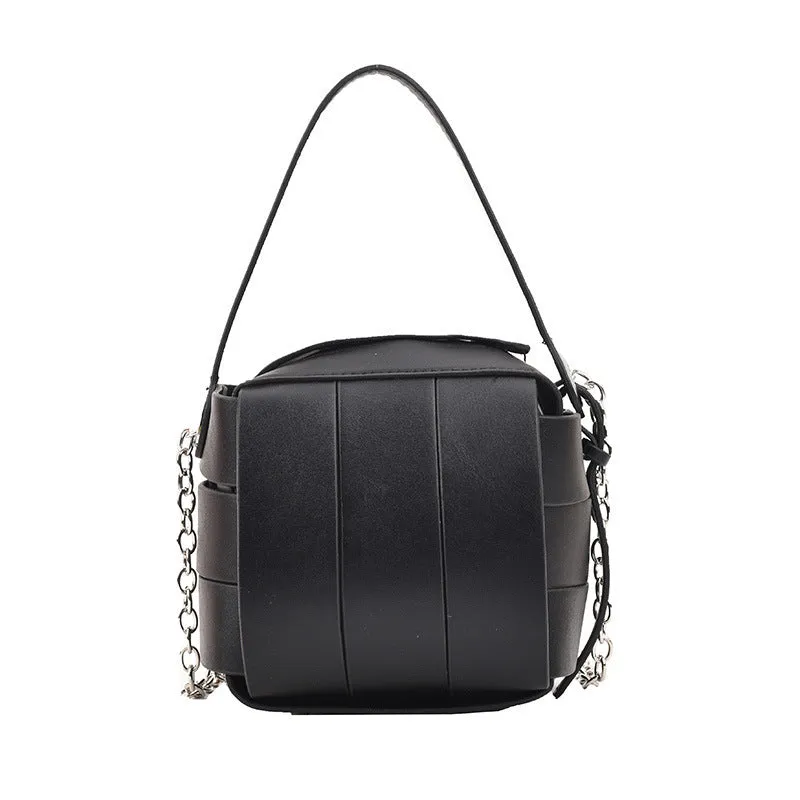 Women's PU leather vintage spliced crossbody handbag in black with magnetic buckle closure, 14cm size
