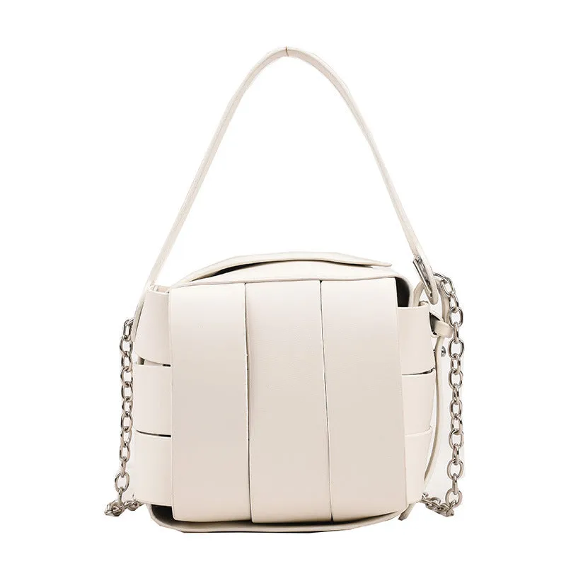 Women's PU leather vintage spliced crossbody handbag in black with magnetic buckle closure, 14cm size