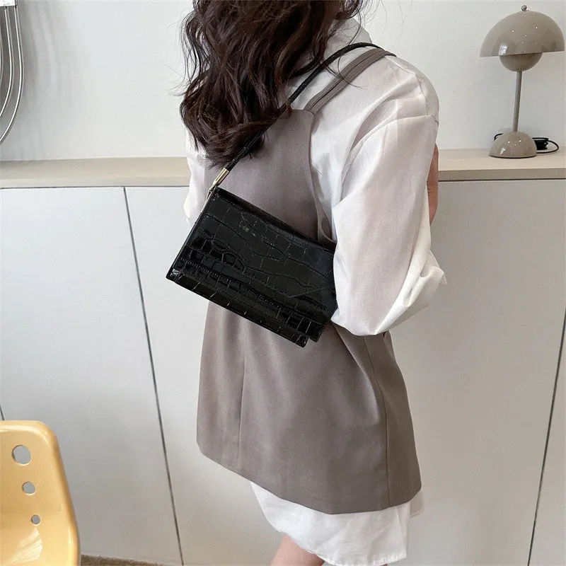 Women's solid colour PU shoulder messenger bag with sewing thread detail, horizontal square shape, black option
