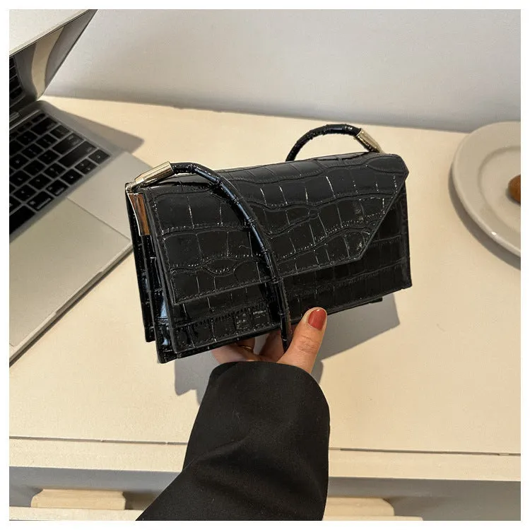 Women's solid colour PU shoulder messenger bag with sewing thread detail, horizontal square shape, black option