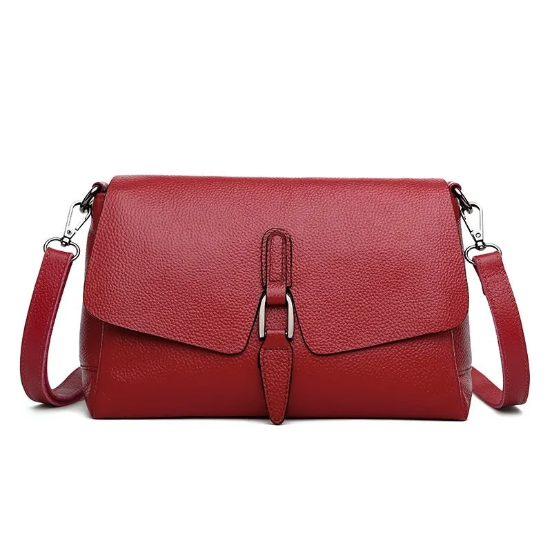 Women's soft first layer cowhide shoulder bag in black with adjustable strap and multiple pockets
