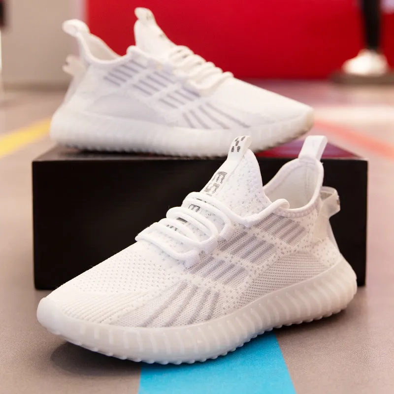 Men's breathable flying fabric sports shoes in white colour with mesh lining and round toe design