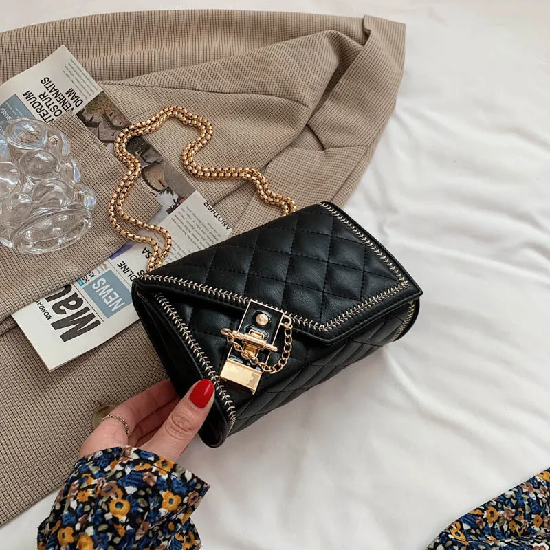 Lingge chain messenger fashion small square bag in black with rhombus pattern, lock closure, and chain handle