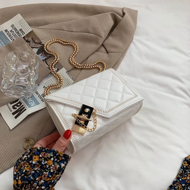 Lingge chain messenger fashion small square bag in black with rhombus pattern, lock closure, and chain handle