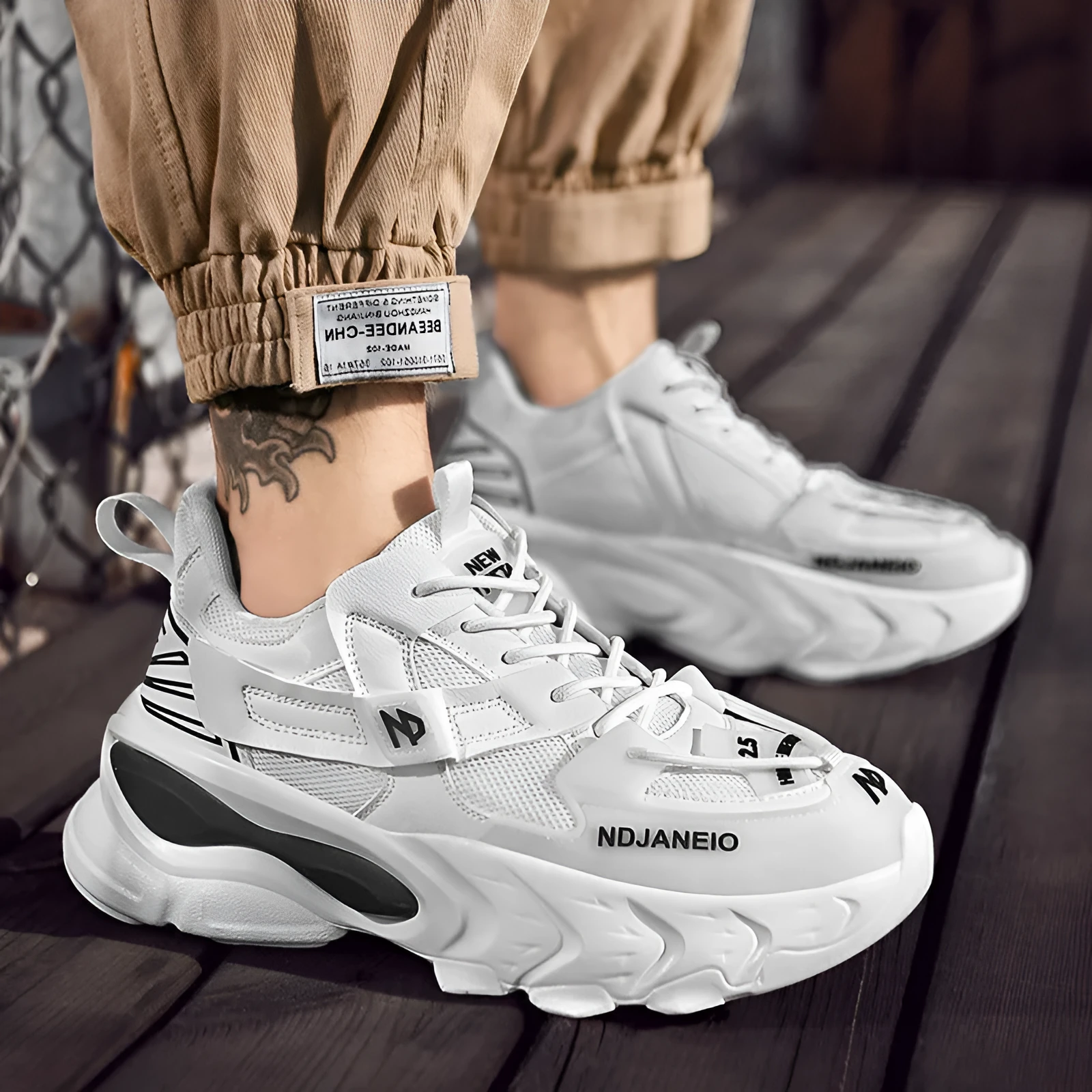 Breathable mesh casual sneaker for men with cross shoulder straps, low top, flat heel, available in black white beige sizes 39-44