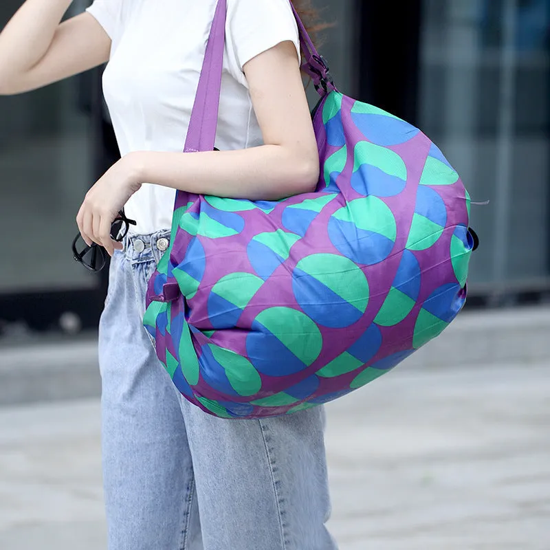 Large capacity foldable nylon shopping bag in beige yellow, open and full with groceries