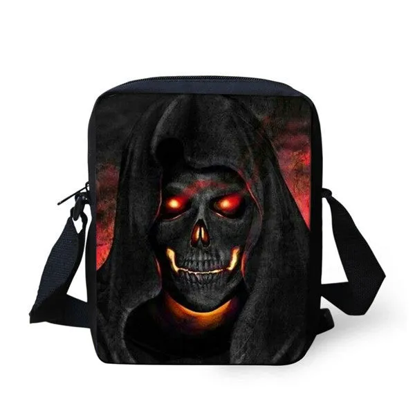 A medium-sized black children's messenger bag with a white skull print, showing double shoulder straps and a front zipper pocket.