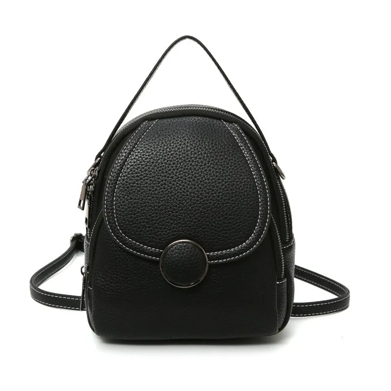 Fashion mini backpack in PU leather, compact 20x23x8 cm size, available in black and brown, with soft handle and zippered interior
