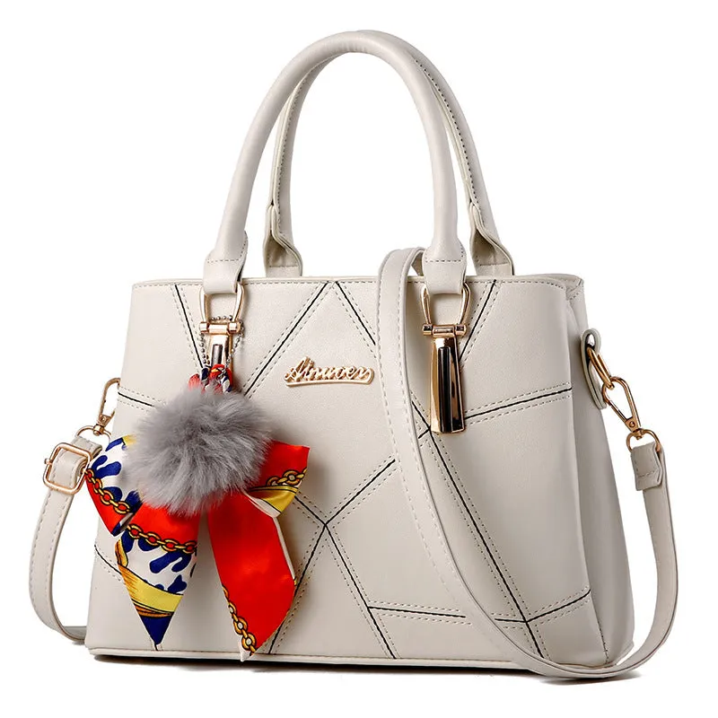 Women's cross section square PU messenger bag with embroidery in royal blue colour showing soft handle and single shoulder strap