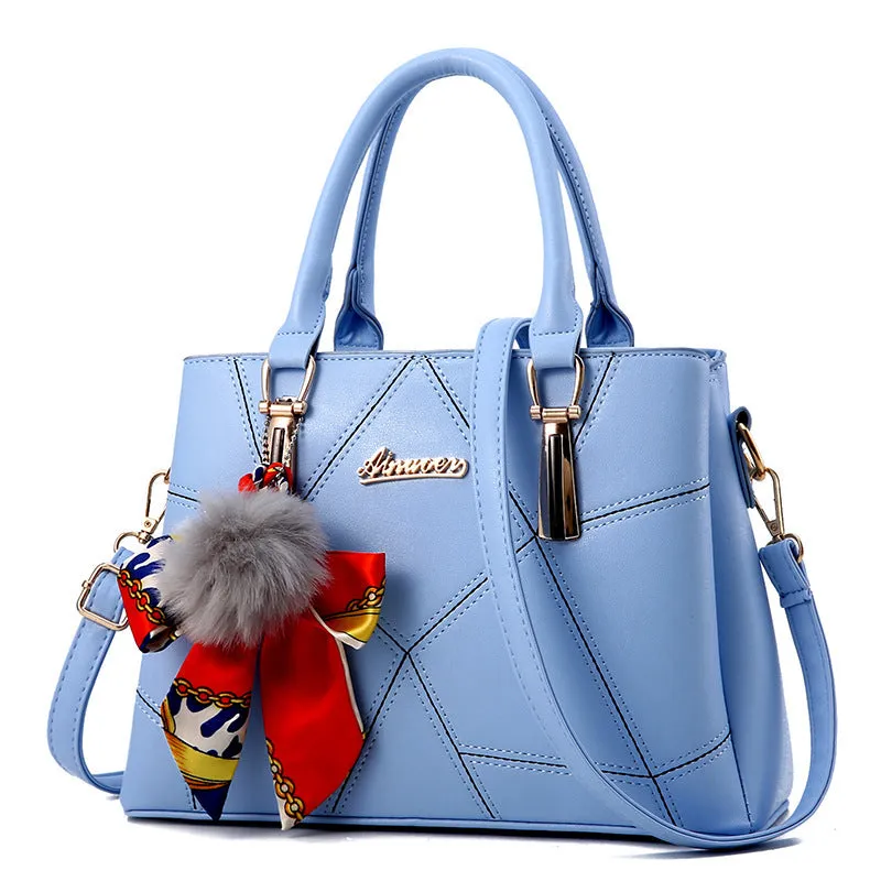 Women's cross section square PU messenger bag with embroidery in royal blue colour showing soft handle and single shoulder strap