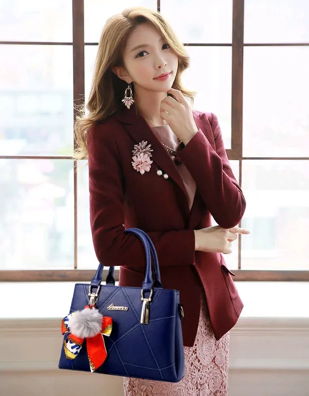 Women's cross section square PU messenger bag with embroidery in royal blue colour showing soft handle and single shoulder strap