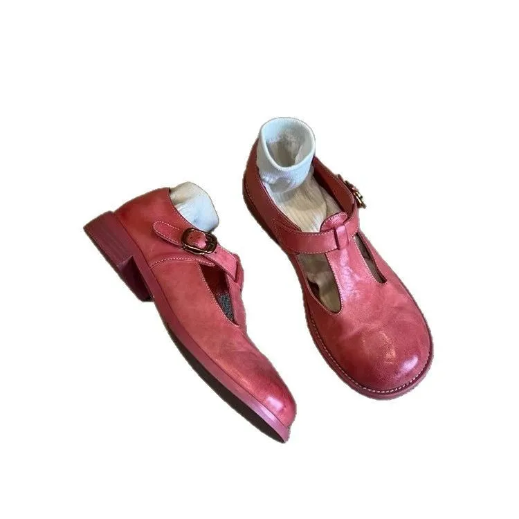 Women's retro round toe pumps in pink brush colour with low heel and buckle closure