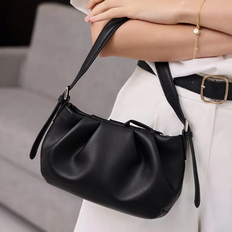 Genuine leather one-shoulder crossbody bag with folds cloud design, zip closure, compact 20x13x7cm size, black colour