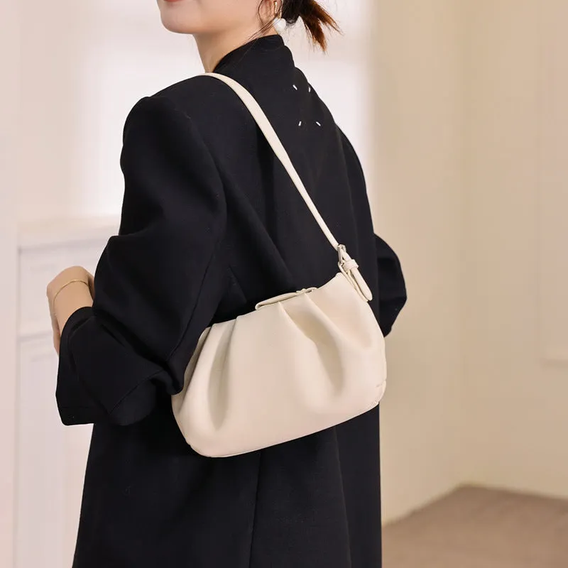 Genuine leather one-shoulder crossbody bag with folds cloud design, zip closure, compact 20x13x7cm size, black colour