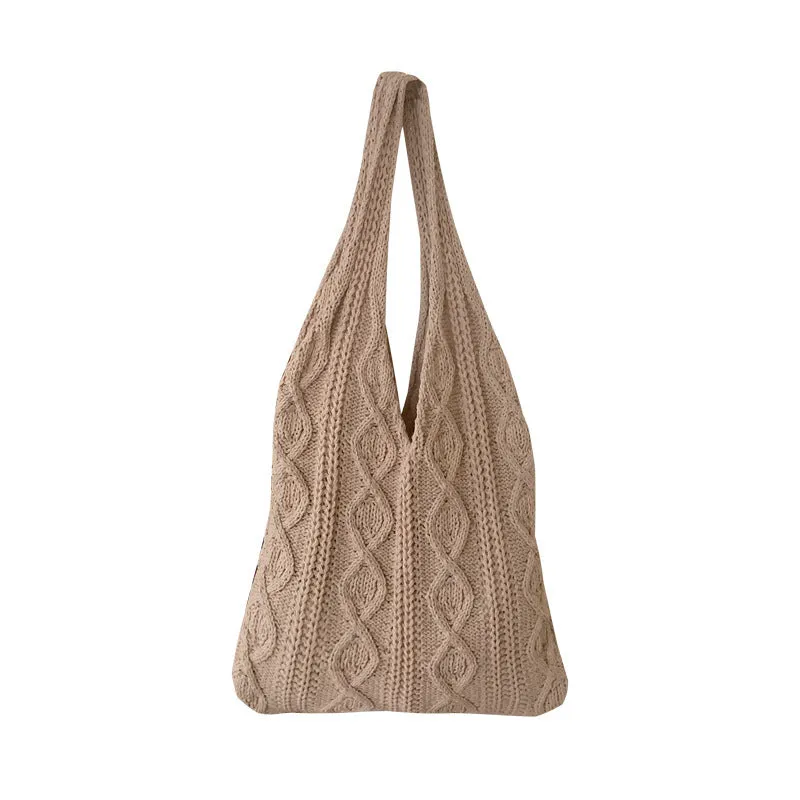Retro hollow knitted wool yarn women's shoulder tote bag in a solid colour with double straps.