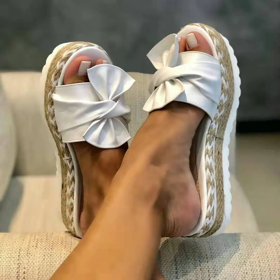 Platform wedge heel ladies bow sandals in cloth with imitation leather lining, size 35-43, multiple colours
