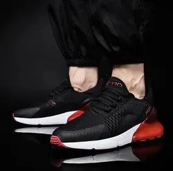 Men's mesh casual shoe with front strap, rubber sole, colour-blocked upper in black and red