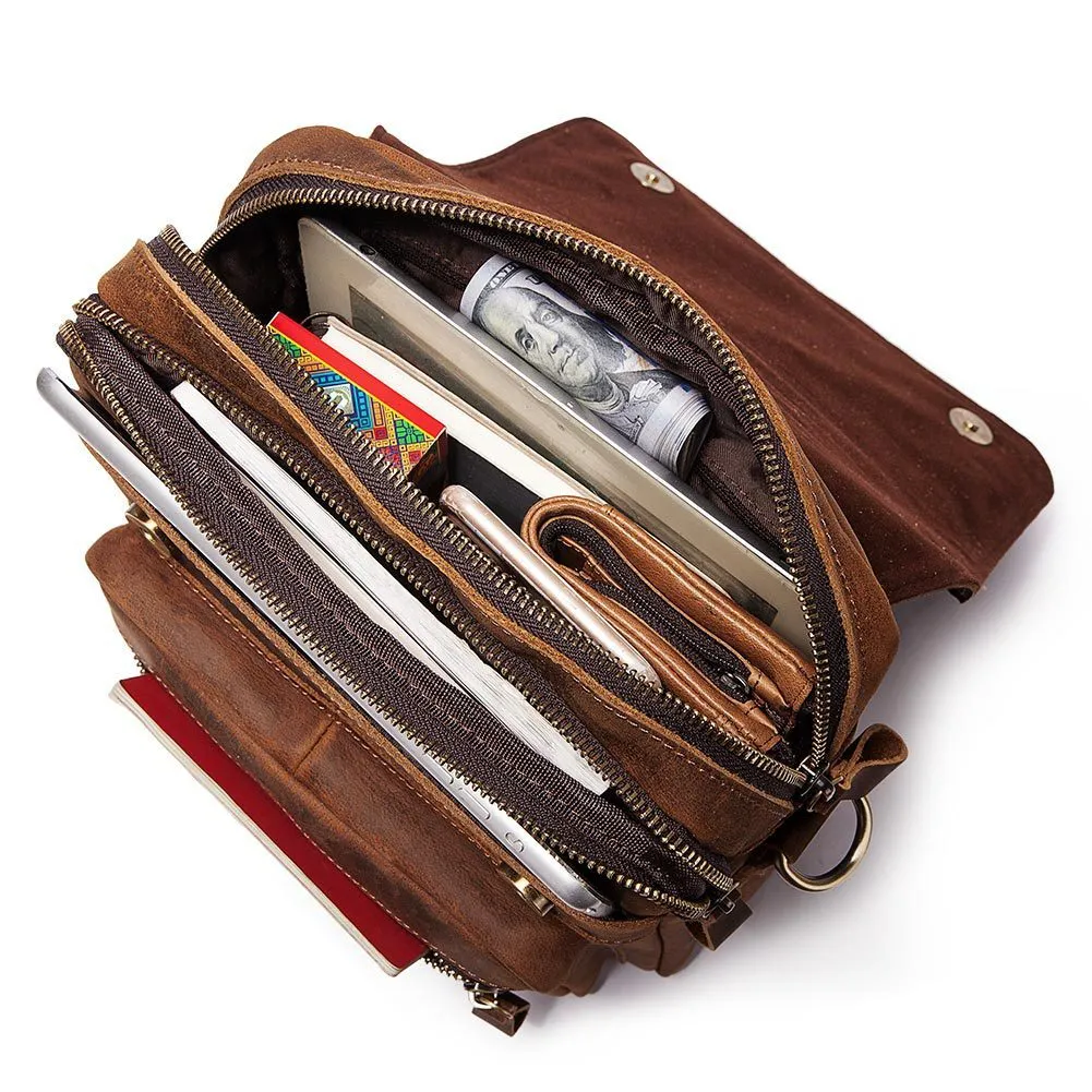Men's brown leather shoulder bag with zipper buckle closure on soft surface