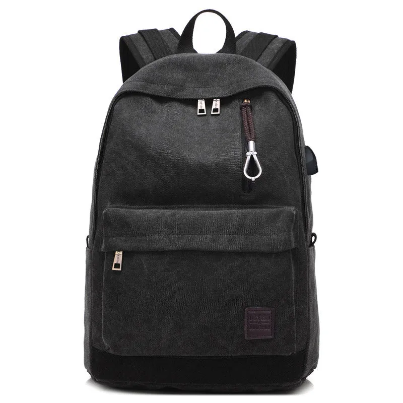 Canvas backpack with USB charging port and multiple compartments including separate laptop pocket