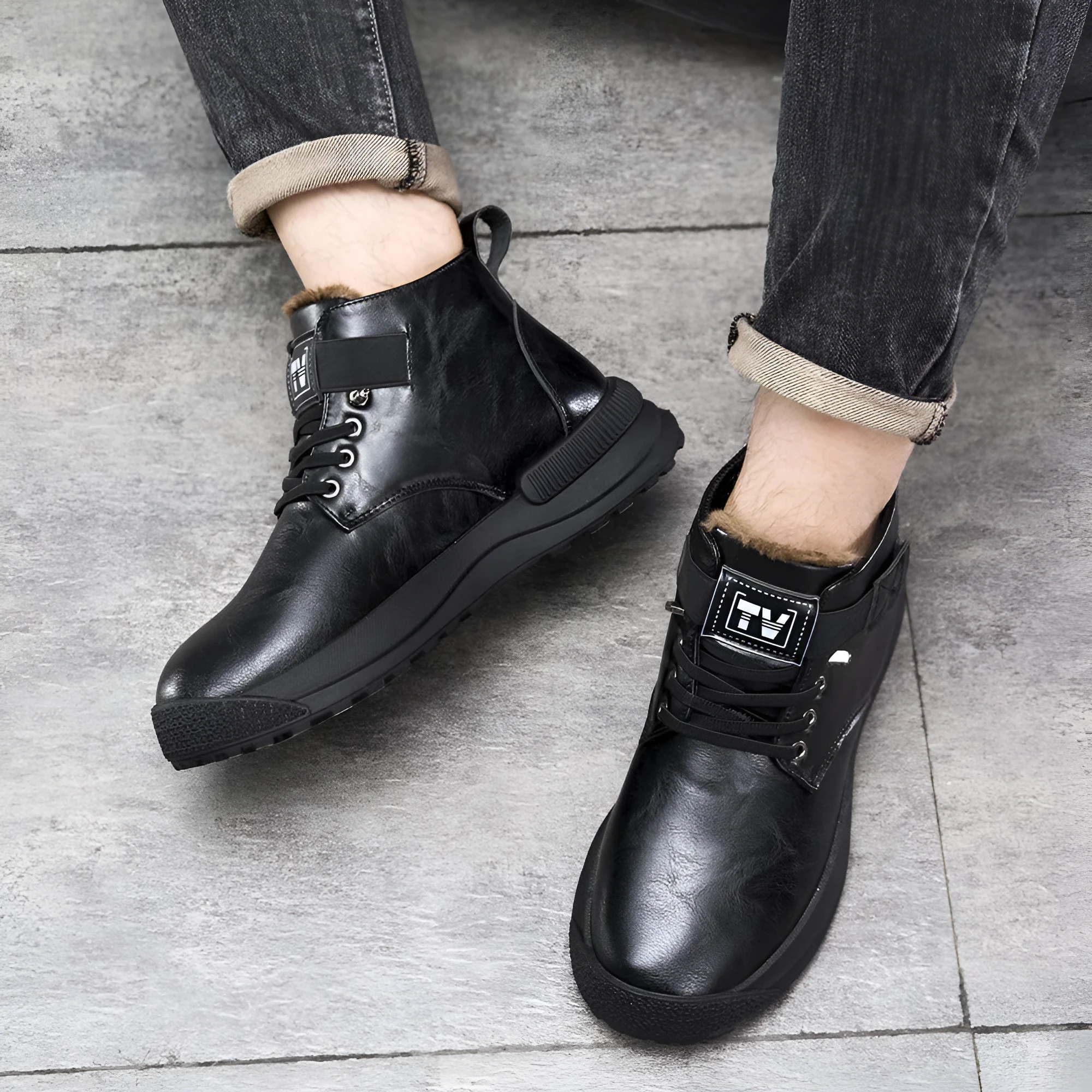 Black high-top platform Martin boots with a velvet-textured upper and thick rubber sole.