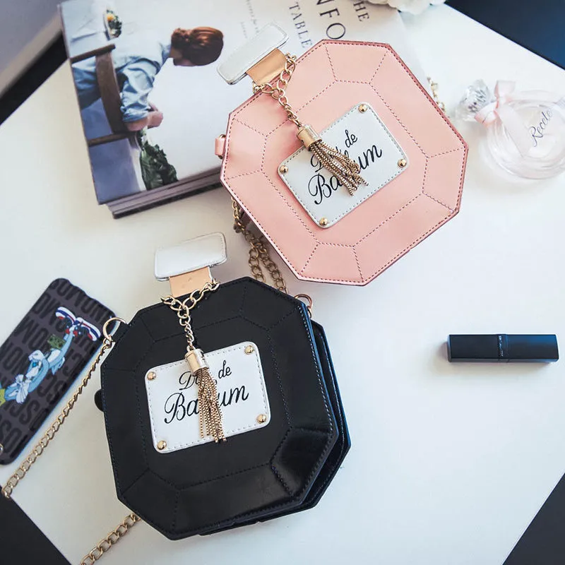 Mini chain crossbody bag women's round PU medium shoulder bag with printed letters and zipper closure in black