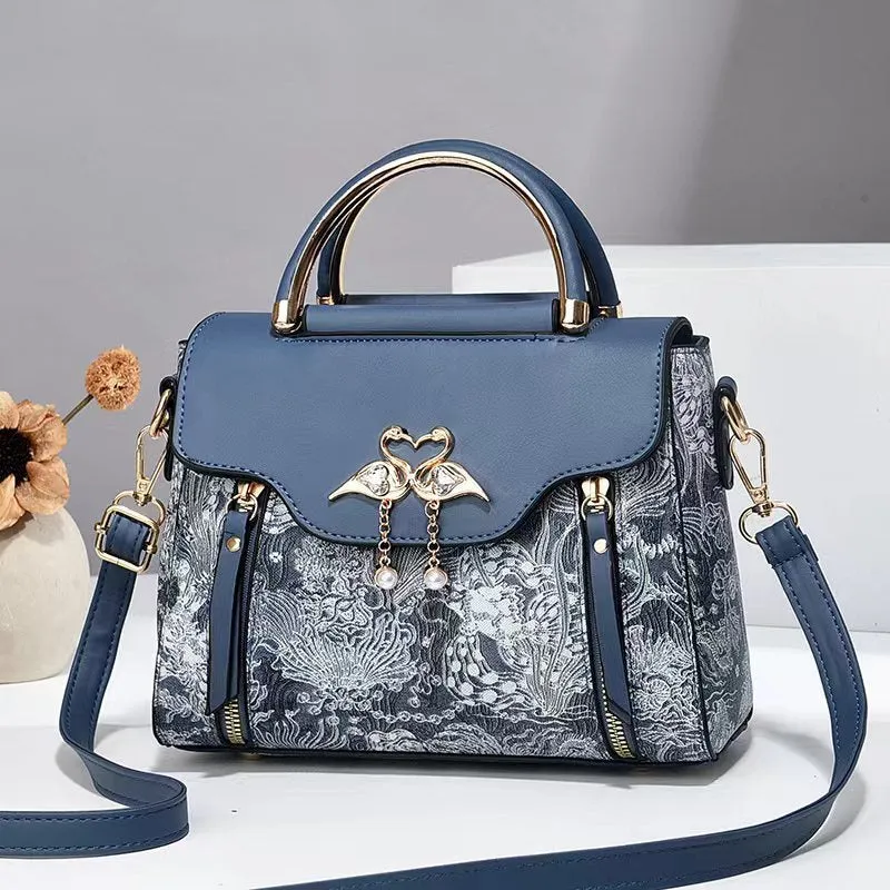 Women's PU crossbody bag in black with woven texture, horizontal square shape, and single shoulder strap