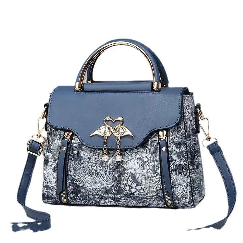 Women's PU crossbody bag in black with woven texture, horizontal square shape, and single shoulder strap