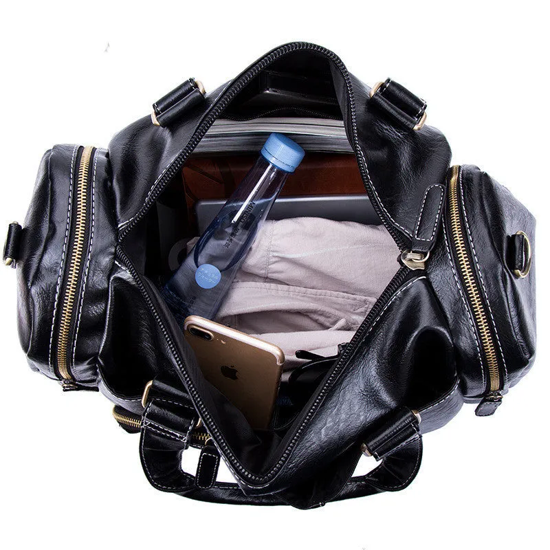 Large black men's PU travel fitness bag with stitched detailing and trolley sleeve