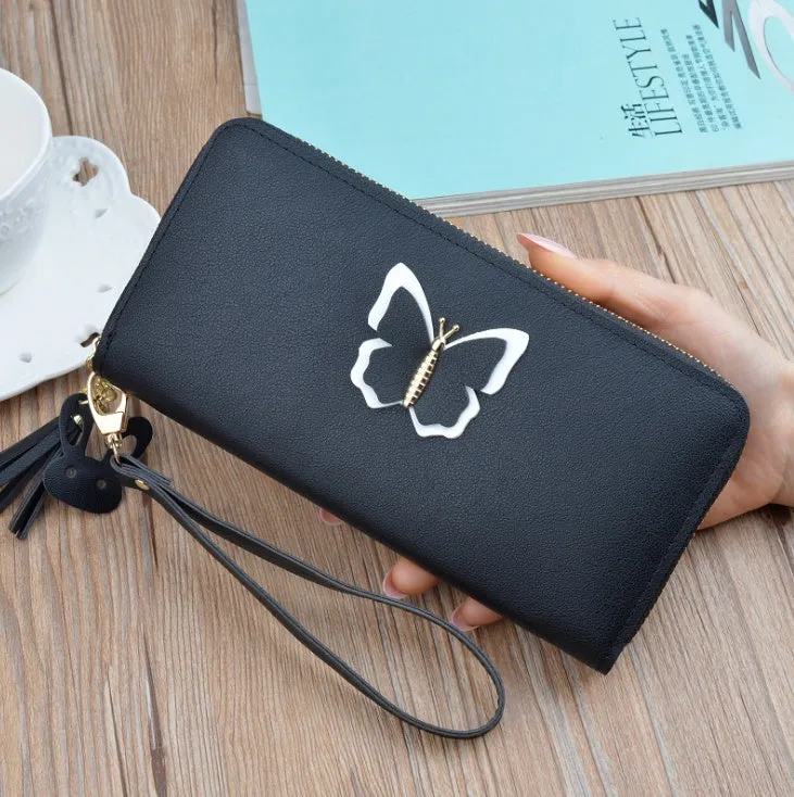 Women's long zip wallet in black PU leather with zipper closure and compact dimensions