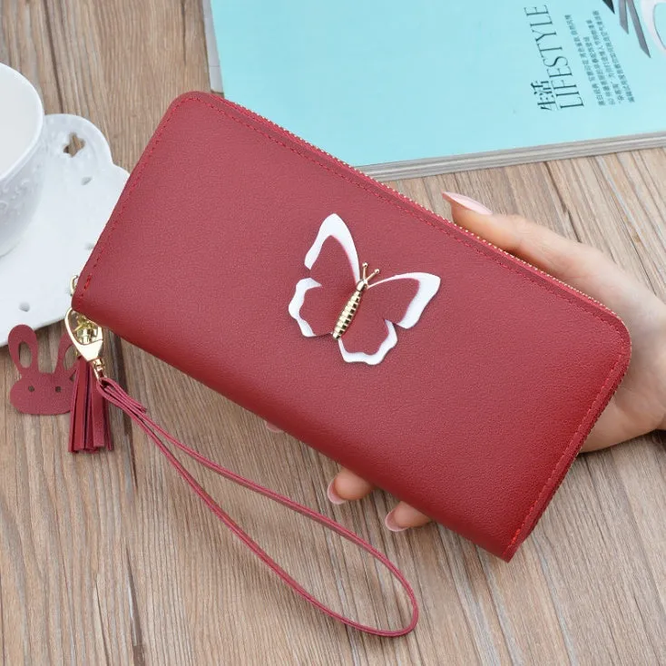 Women's long zip wallet in black PU leather with zipper closure and compact dimensions