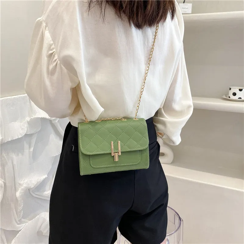 Women's diamond lattice chain crossbody bag in PU leather with adjustable strap
