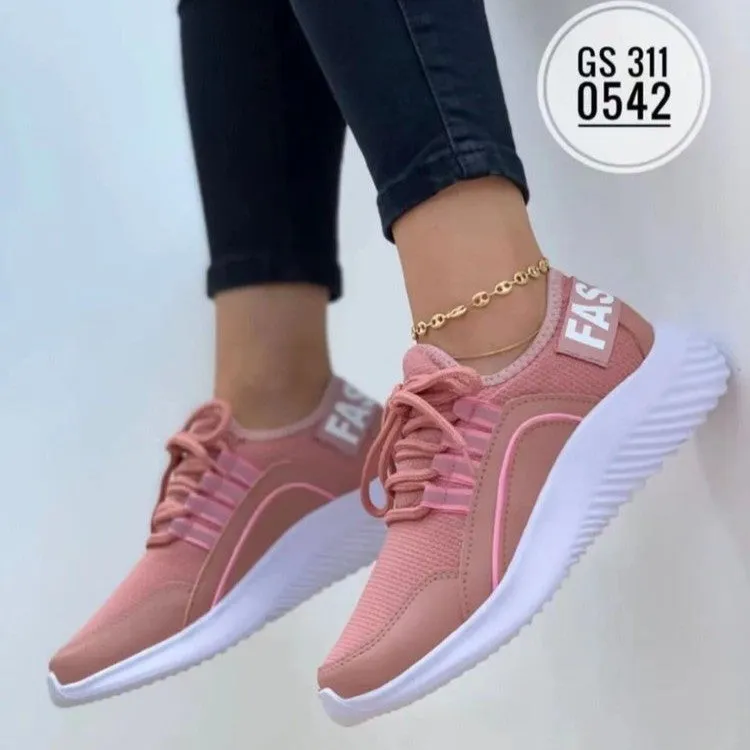 Women's lace up mesh sneakers in pink with cross strap design, round toe, rubber sole, medium heel