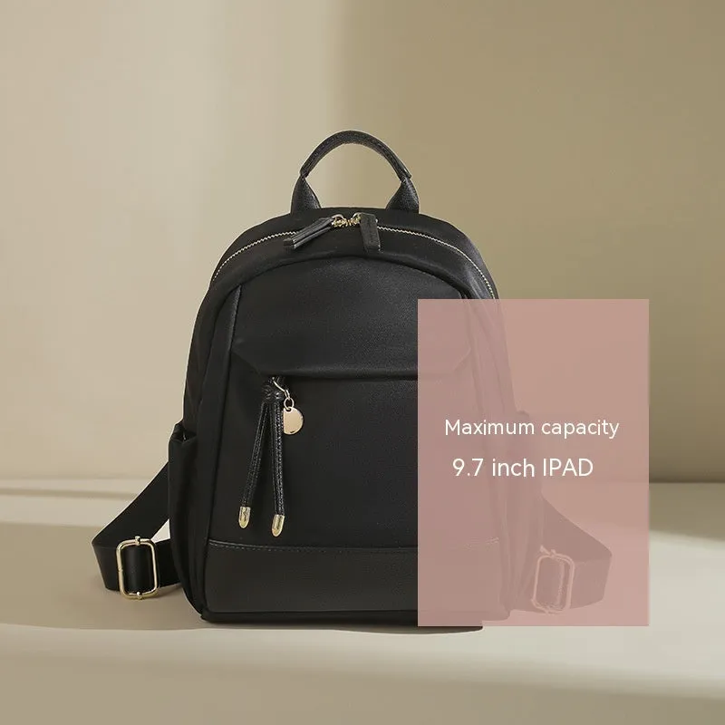 Women's double shoulder Oxford cloth backpack in almond colour with contrast stitching and open outer pocket