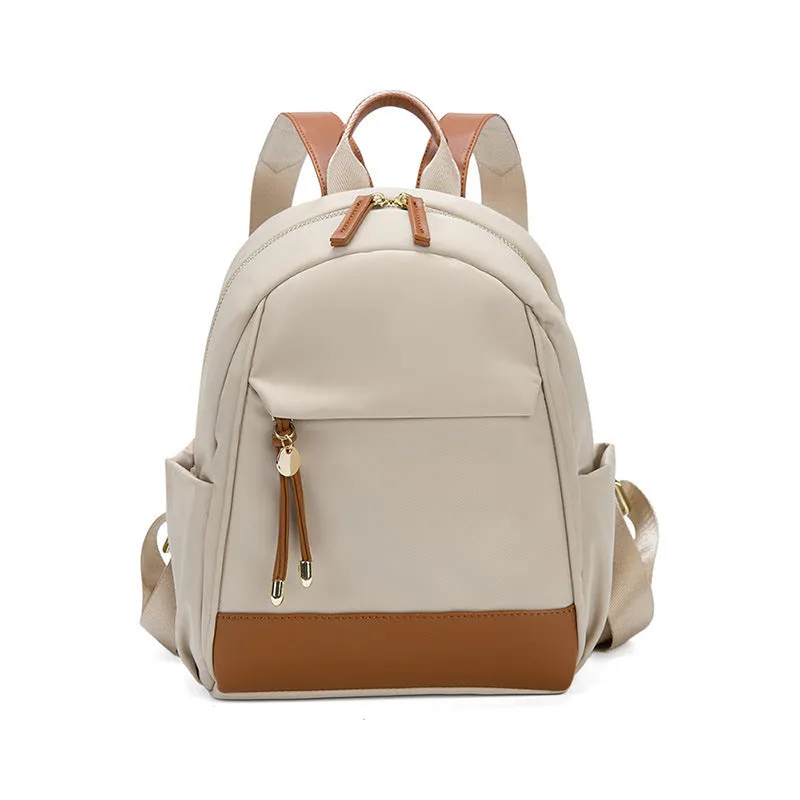 Women's double shoulder Oxford cloth backpack in almond colour with contrast stitching and open outer pocket