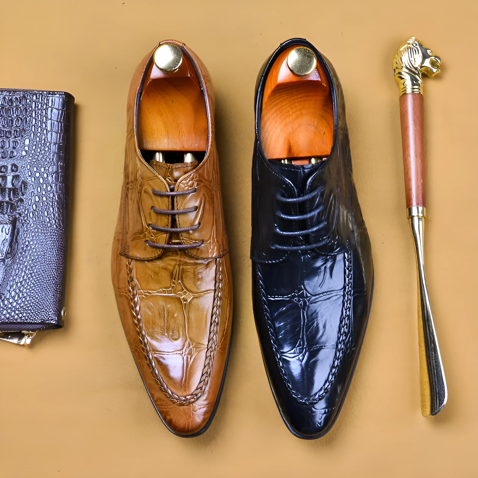 Men's black leather oxford shoes with a horse bit buckle and pointed toe on a rubber sole.