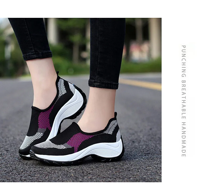 Ladies casual mesh wedge heel platform shoes in black, side view showing hollow mesh upper and round toe