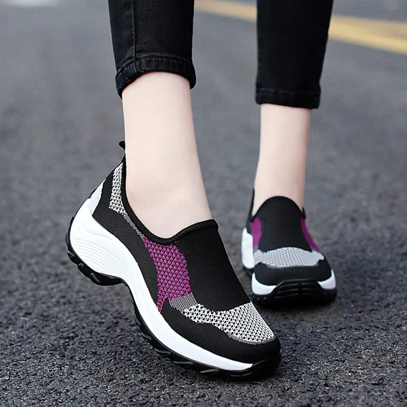 Ladies casual mesh wedge heel platform shoes in black, side view showing hollow mesh upper and round toe