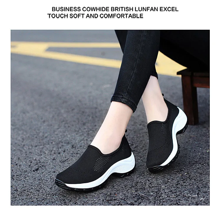 Ladies casual mesh wedge heel platform shoes in black, side view showing hollow mesh upper and round toe
