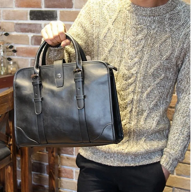Men's cowhide leather handbag in black, horizontal square shape, medium size, with zipper closure and hard handle