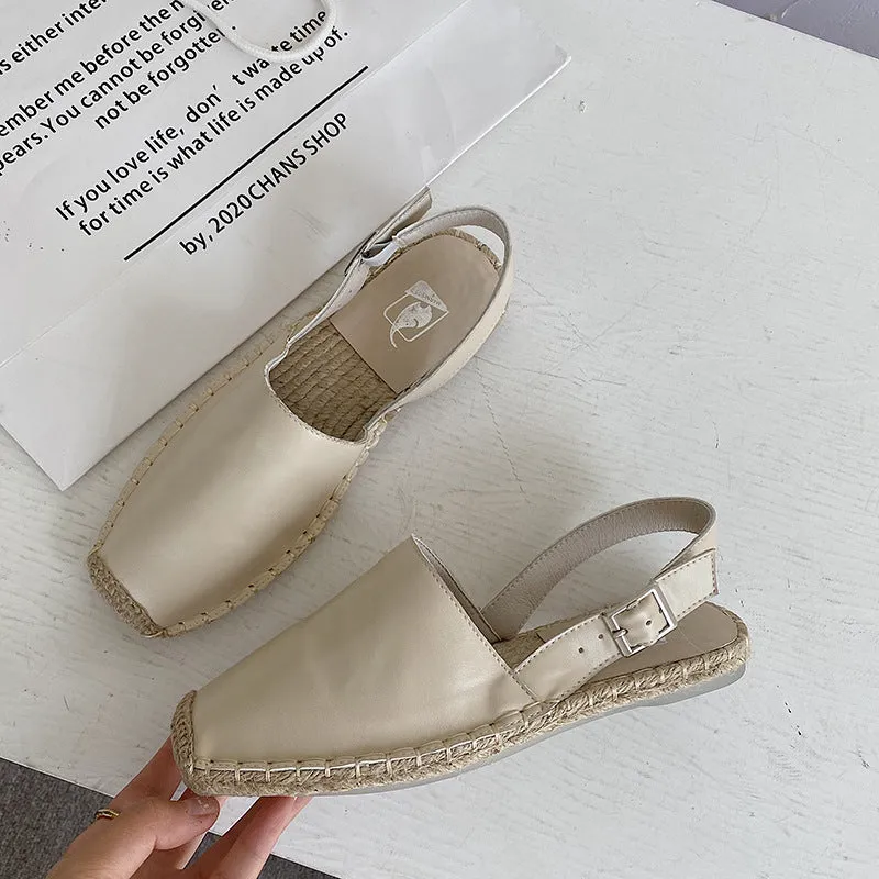 Women's beige retro fisherman flat sandals with canvas upper on a neutral background.