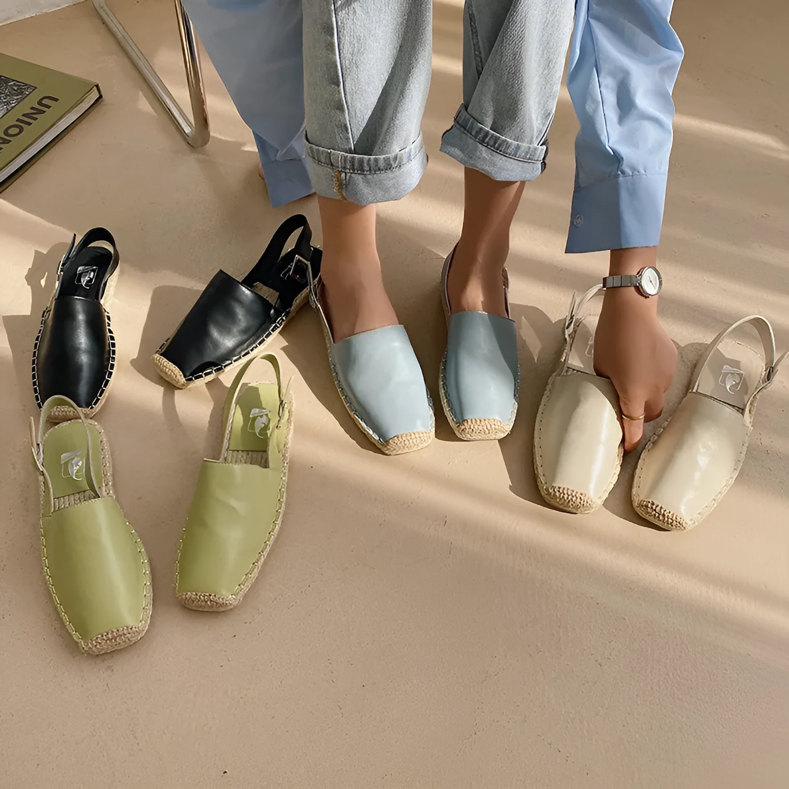 Women's beige retro fisherman flat sandals with canvas upper on a neutral background.