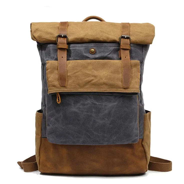 Canvas vintage backpack in khaki showing front zipper pocket and curved shoulder straps with retro square shape
