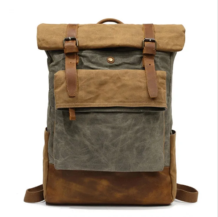 Canvas vintage backpack in khaki showing front zipper pocket and curved shoulder straps with retro square shape