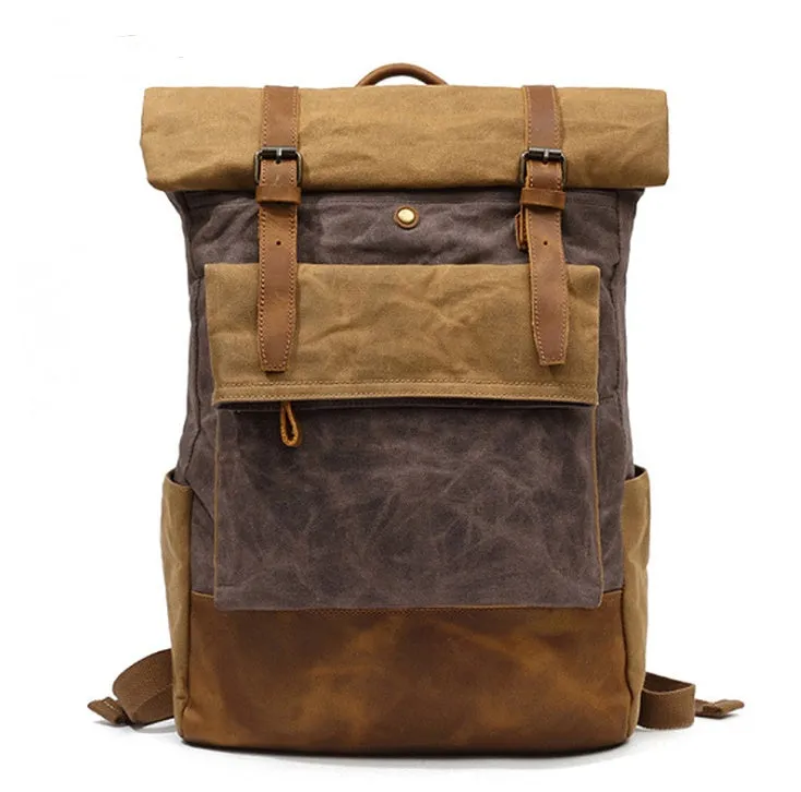 Canvas vintage backpack in khaki showing front zipper pocket and curved shoulder straps with retro square shape