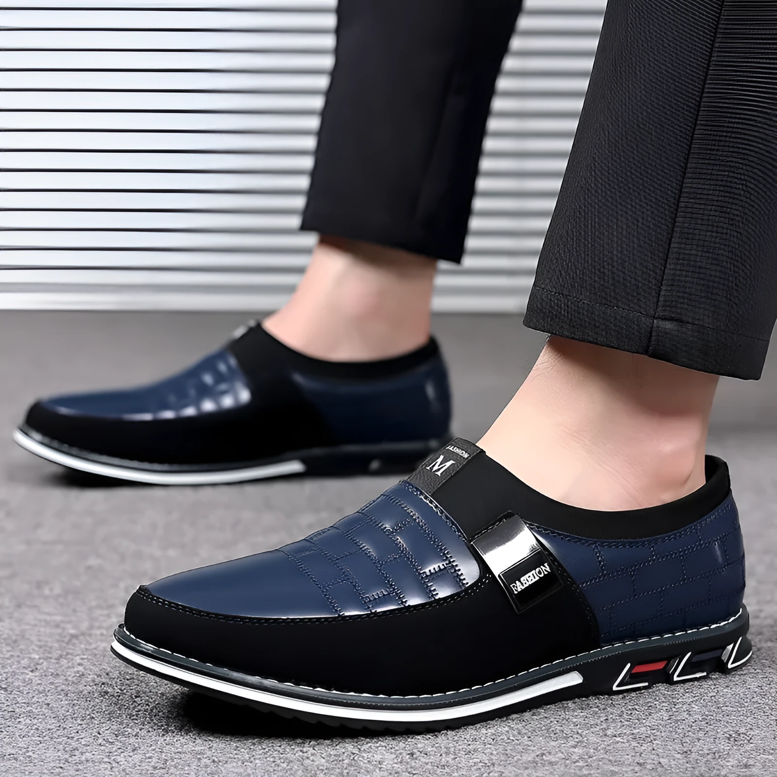 Slip-on men's plus size casual leather shoes in black with round toe and rubber sole